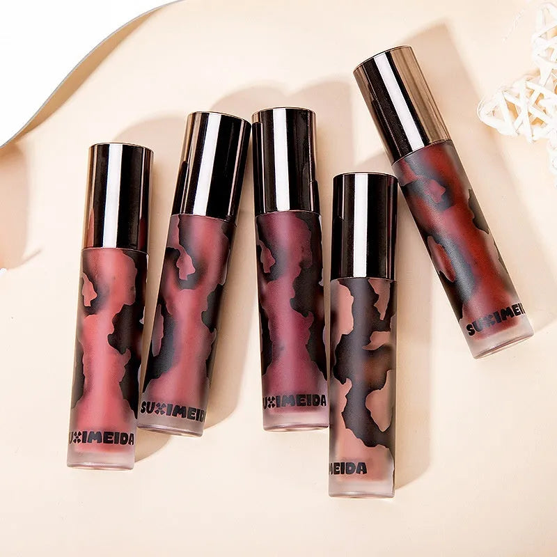 Matte liquid lipstick lip mud in five shades: orange brown, cool grey, cinnamon, jujube red, smoked purple.