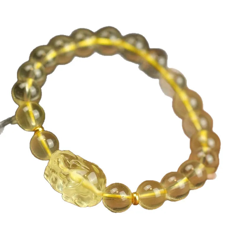 Yellow leather bracelet with citrine artificial crystal beads and Pi Xiu charm in Chinese national style.