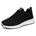 Women's Flyknit running shoes in black, rose red, and grey pink on a white background