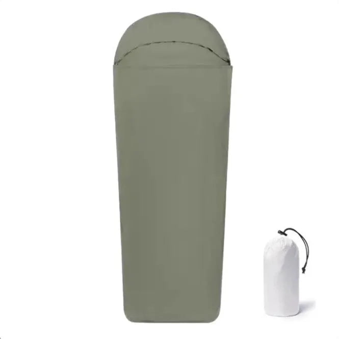 Blue mummy-style nylon camping sleeping bag unrolled, showing tapered shape and matte plaid fabric texture.