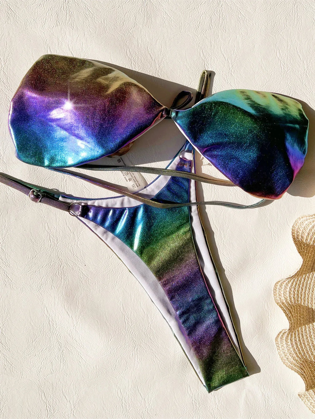 Women's gradient purple two-piece bikini swimsuit set on a mannequin.