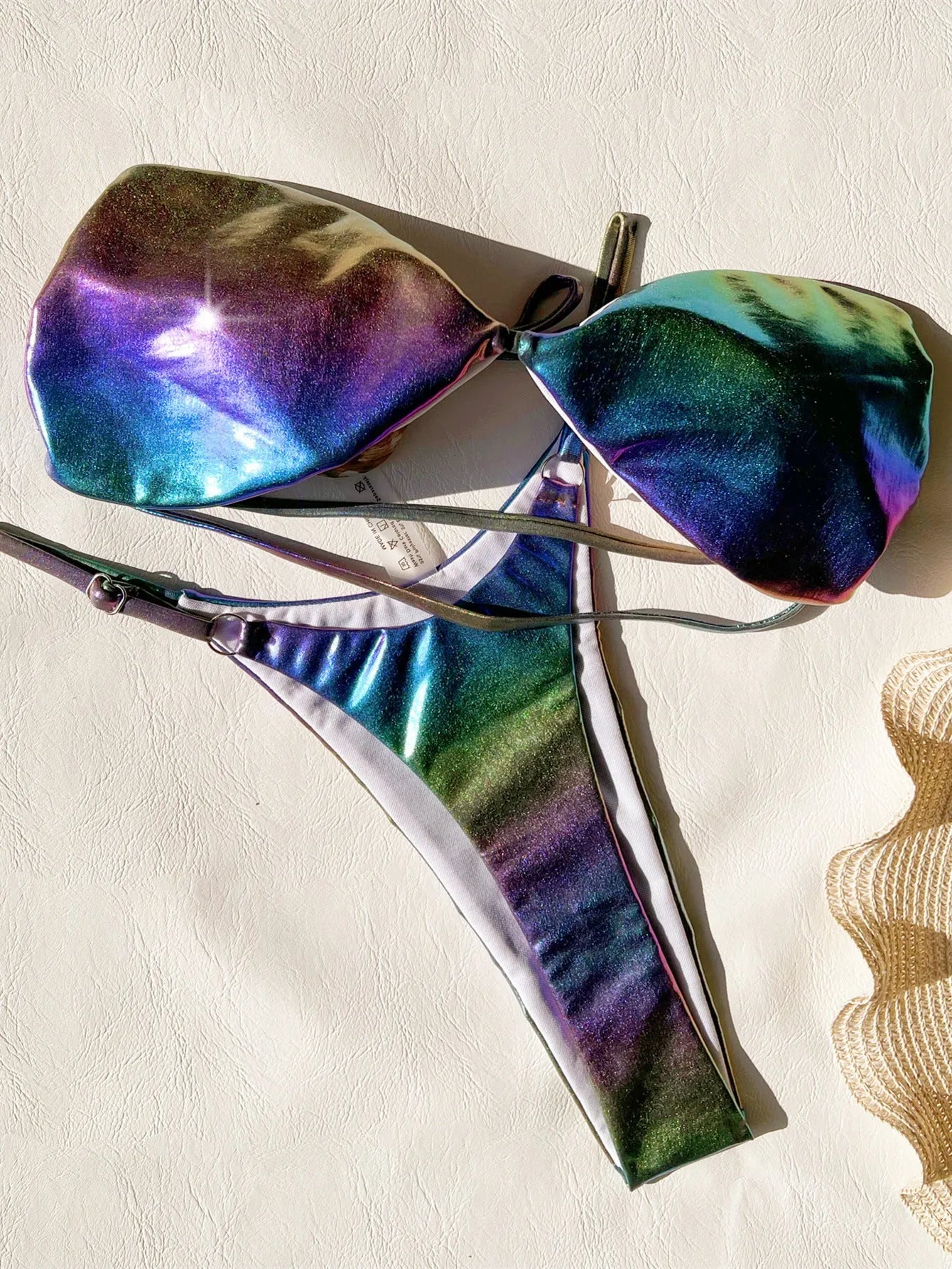 Women's gradient purple two-piece bikini swimsuit set on a mannequin.