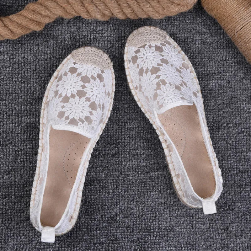 Women's flat-heel linen fisherman shoes in pansy white with sewing thread detail and round toe.