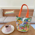 Dream Garden orange plush bucket bag with printed design, canvas lining, and double shoulder straps