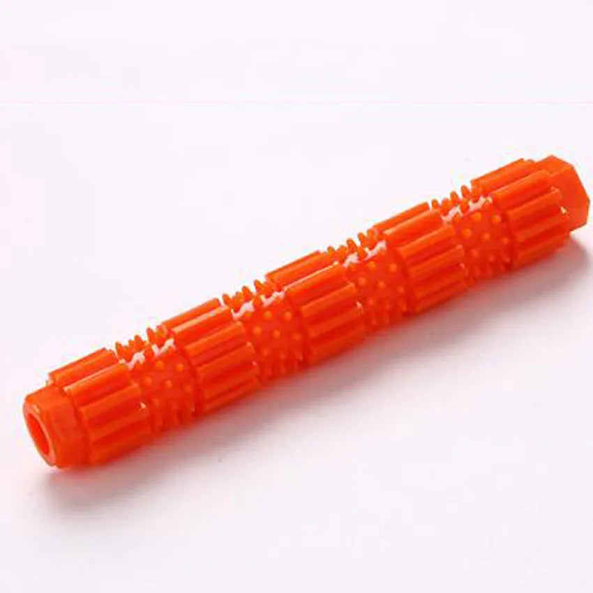 Green natural rubber dog chew toy with textured surface and hollow centre for treats.