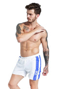 Blue men's slim-fit sports shorts with lace-up front and padding for running and casual wear.