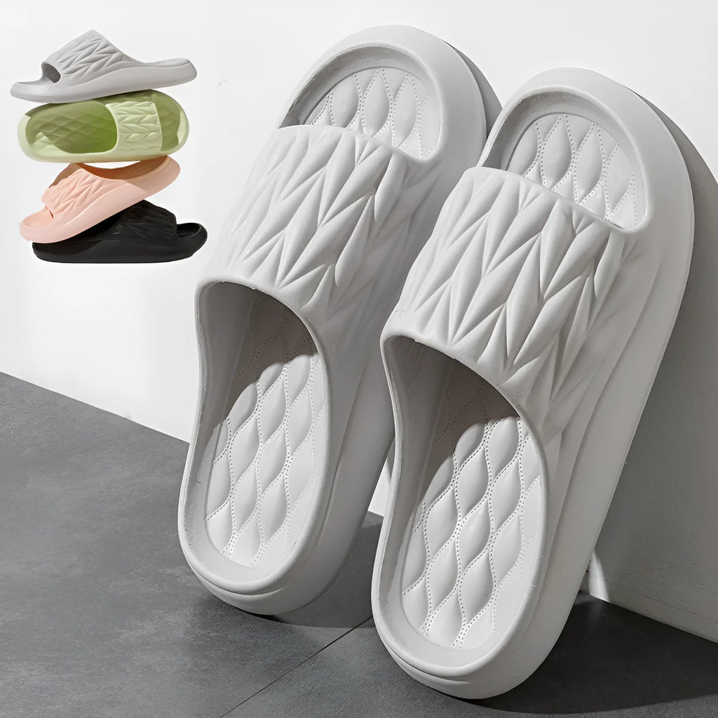Leaf texture pattern EVA slippers for men and women in various colours on a white background.
