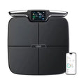 Black square eight-electrode intelligent body fat weighing scale on a floor