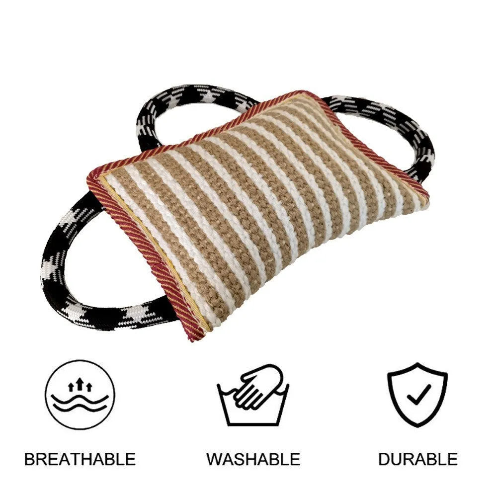 Jute dog tug toy with three rope handles and a central bite pillow for interactive play.