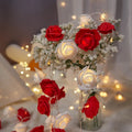LED rose light string with battery pack and PV foam rose heads in multiple colour options