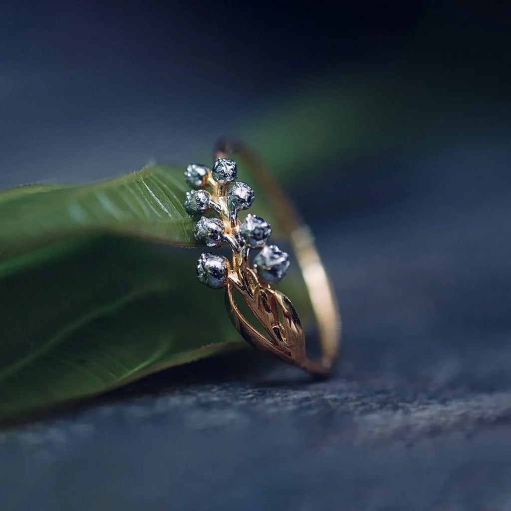 S925 pure silver bell orchid ring with micro inlay, champagne gold finish, on white background