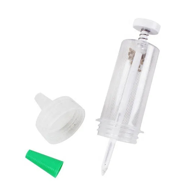 Plastic mini planter tool seeder measuring 12cm length for seed distribution in garden pots
