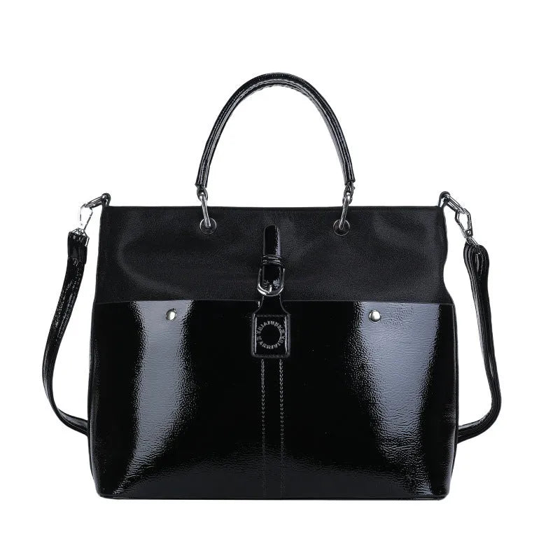 Soft PU shoulder messenger bag in horizontal square shape measuring 33cm by 28cm with sandwich pocket
