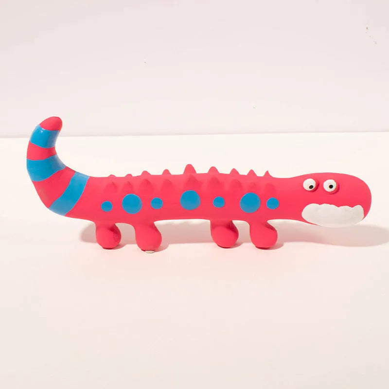 Green cartoon lizard-shaped dog chew toy with a squeaker on a white background.