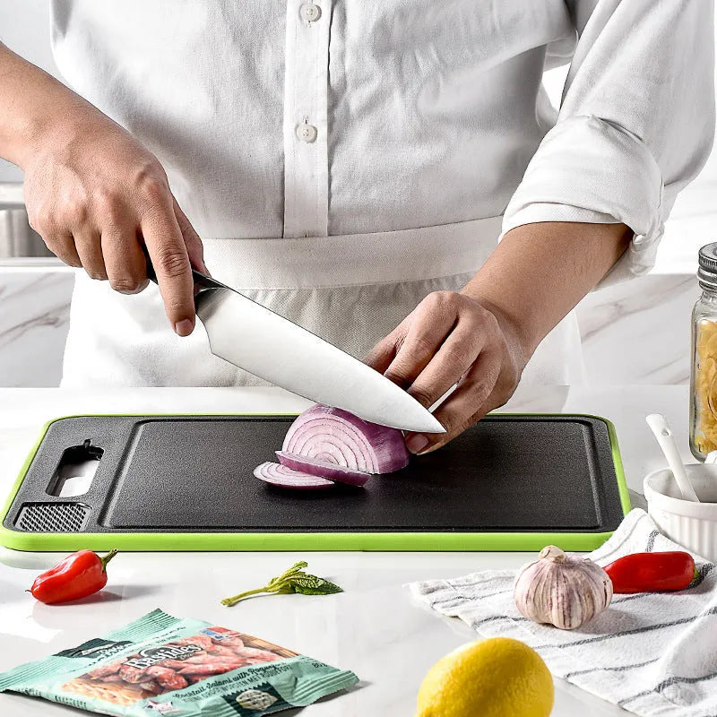 Grey square aluminium cutting board with double sides, grinding teeth and built-in knife sharpener