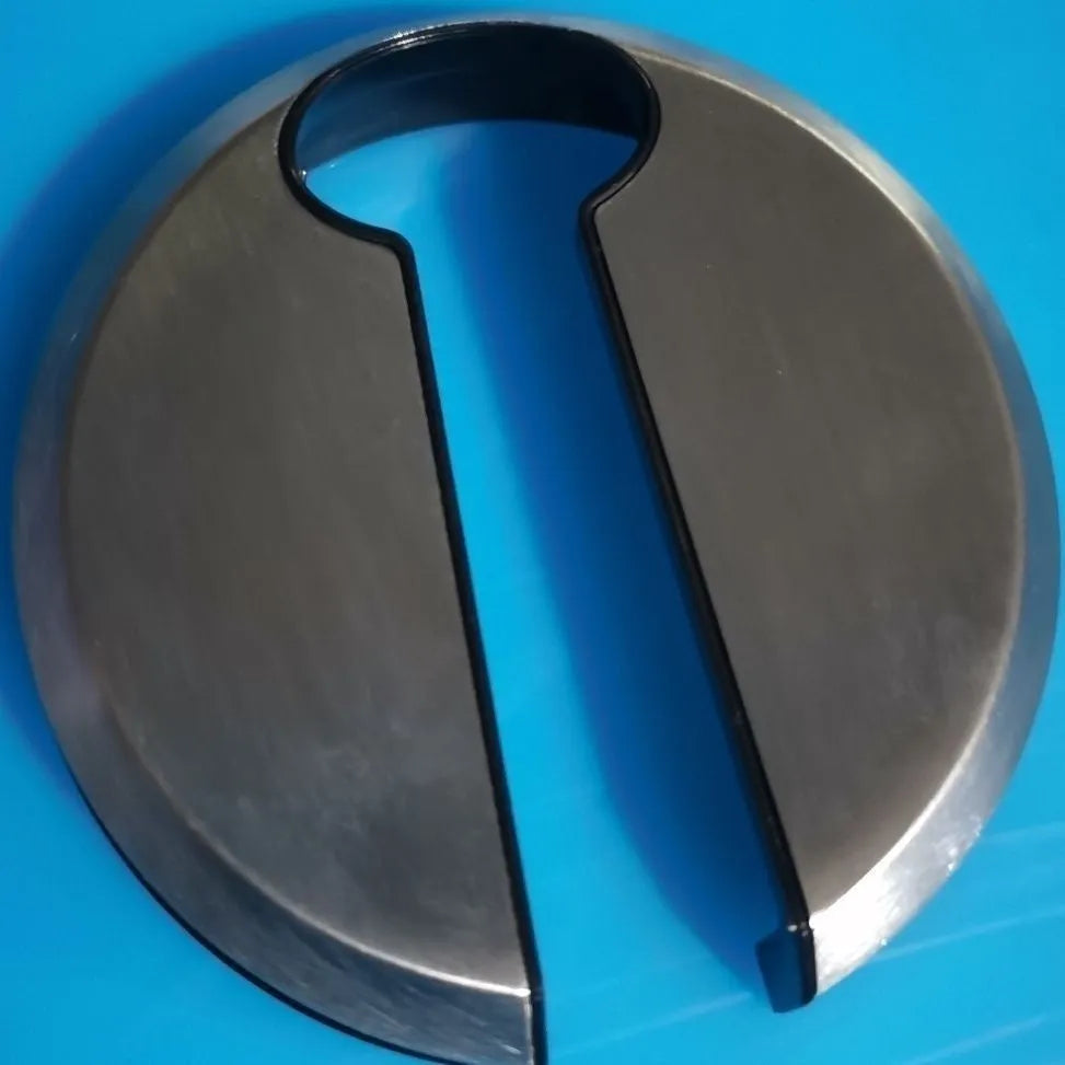 Stainless steel handheld tool combining a wine bottle opener and a serrated foil cutter.