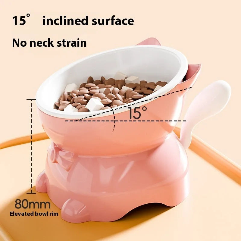 Stainless steel cat bowl with a 15-degree tilt, shown in blue, on a wooden floor.