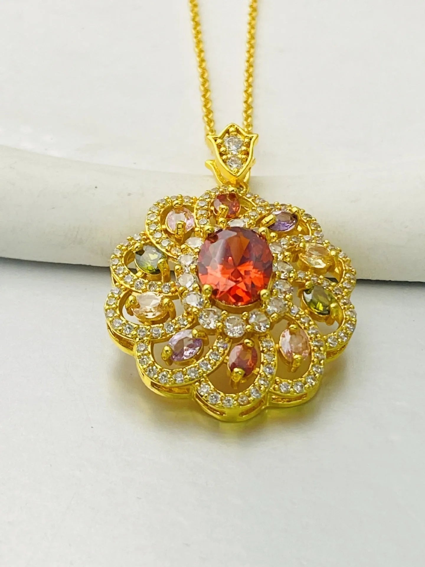 Women's floral zircon pendant necklace in gold, champagne gold, or platinum colour electroplated finish.