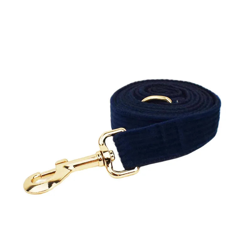 Navy blue corduroy dog collar and leash set with matching vest, poop bag, and decorative bow