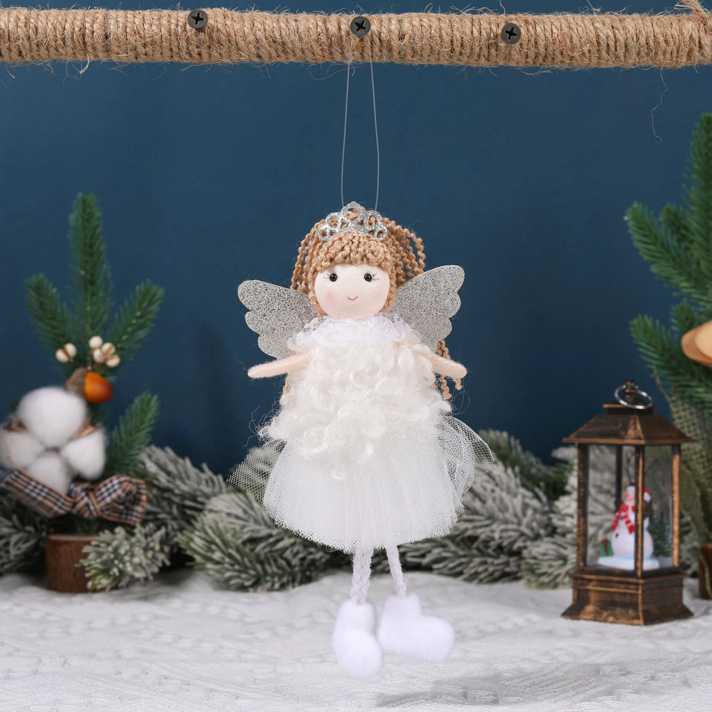 Cartoon angel cloth hair pendant on a girl's high ponytail in white, pink, and khaki colours.