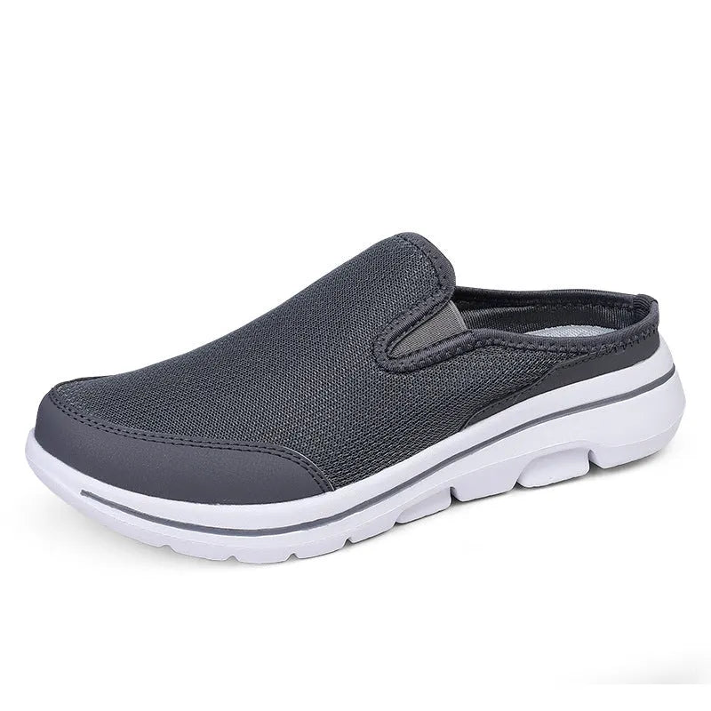 Breathable mesh toe holder slippers in solid colours on a flat heel sole.