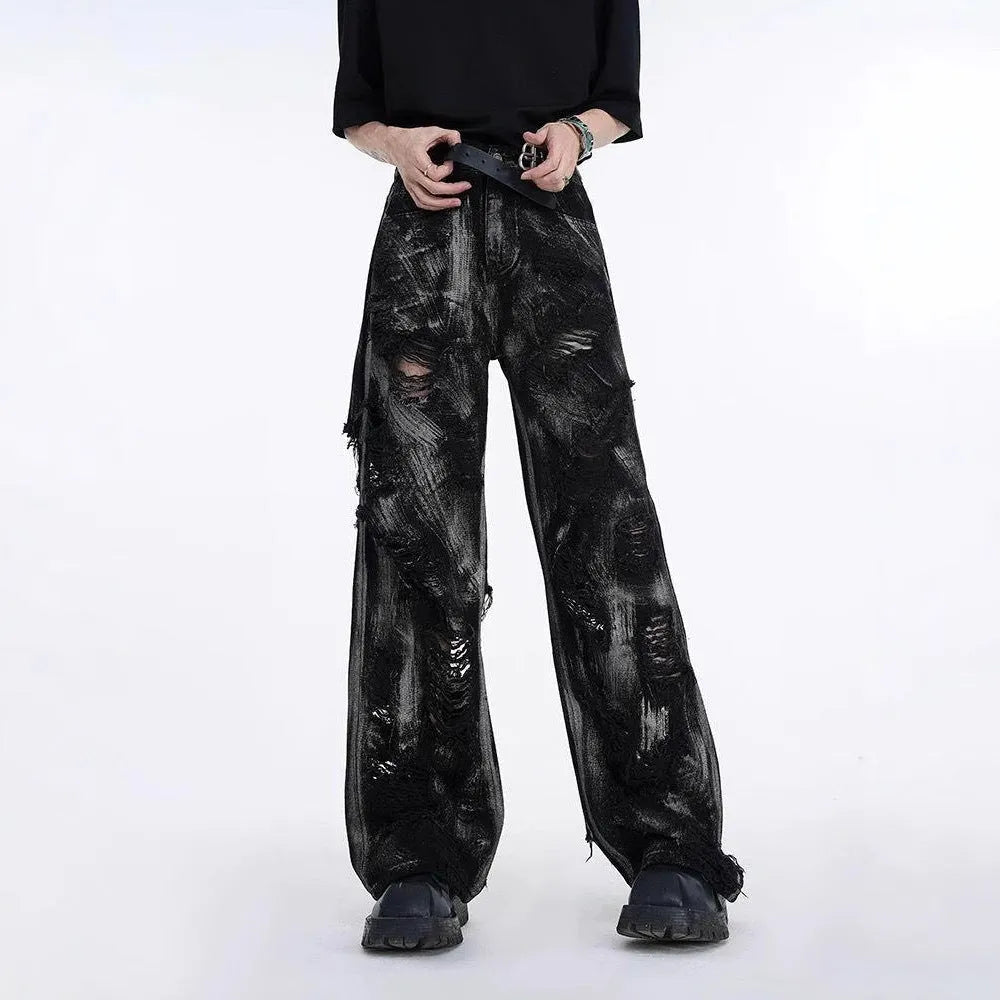 Men's heavyweight washed graffiti denim jeans in black colour showing mid-waist cut and zipper fly