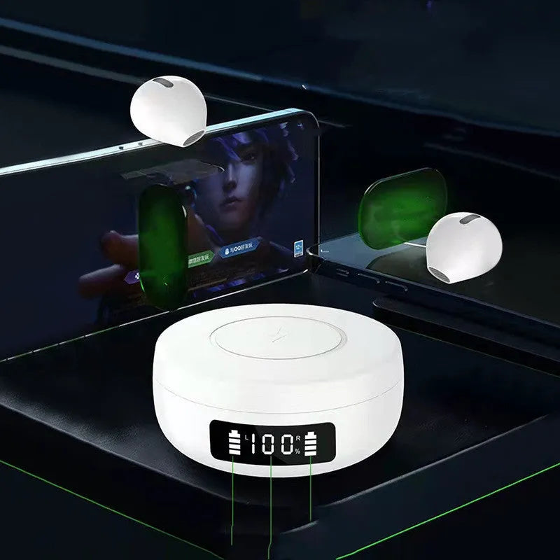 Black wireless semi-in-ear headphones next to their white charging case on a table.