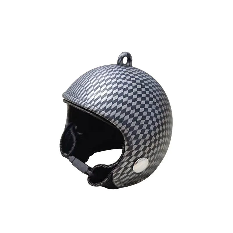 Colourful plastic chicken helmet for small pets on a white background