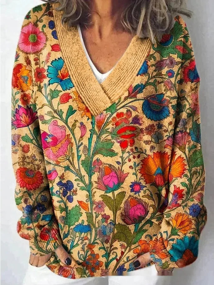 Women's V-neck long sleeve sweatshirt with a textured 3D floral print pattern in a retro style.