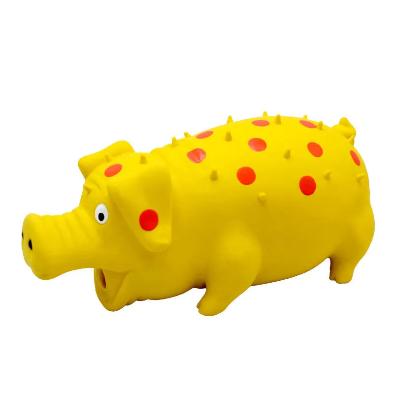 Blue latex pig-shaped dog chew toy with textured surface and squeaker on a wooden floor.