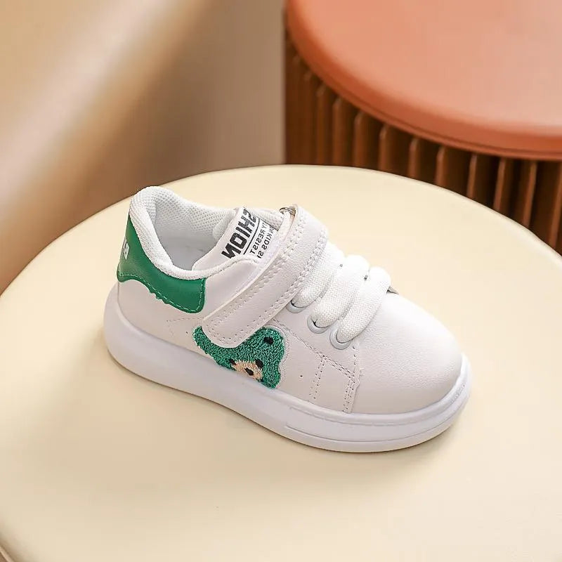 Baby Bear cartoon pattern kids sports sneakers in black, green, and khaki on a white background.