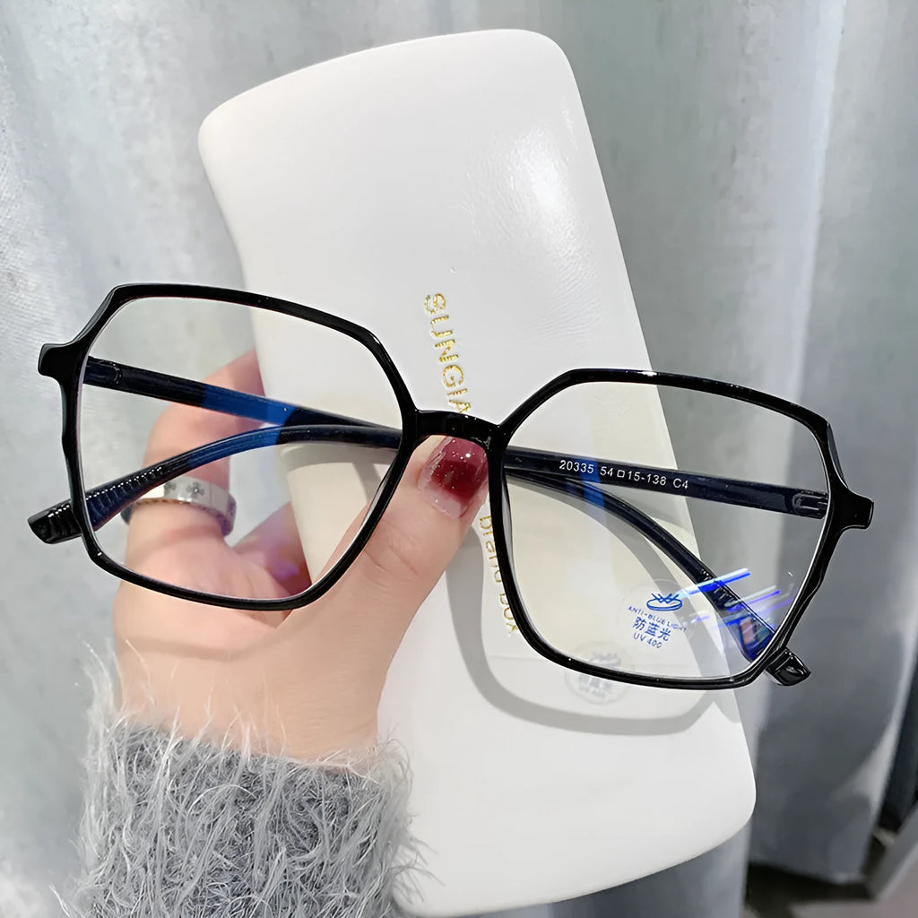 Women's fashion flat glasses with transparent plate frame and AC lenses on a white background
