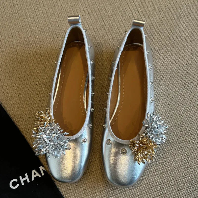 Solid colour sheepskin Mary Jane flat shoes with a round toe and buckle fastening.