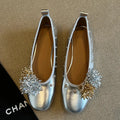 Solid colour sheepskin Mary Jane flat shoes with a round toe and buckle fastening.