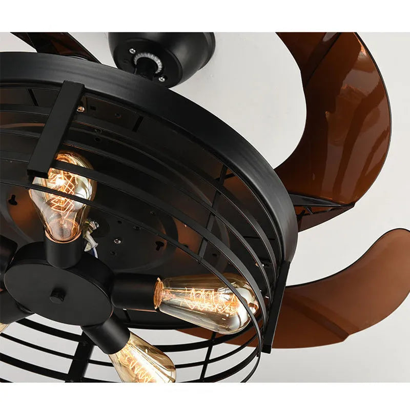 American retro style ceiling fan with clear acrylic blades and an integrated acrylic lampshade, remote control on a table.
