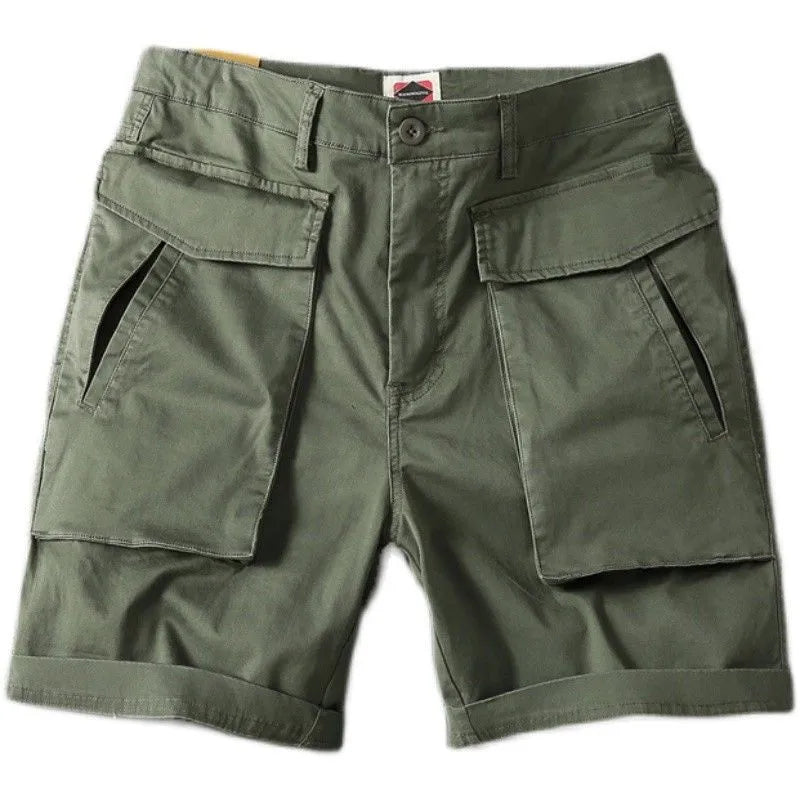 Men's beige cargo shorts with multiple pockets on a plain background, showing straight-leg fit and button closure.