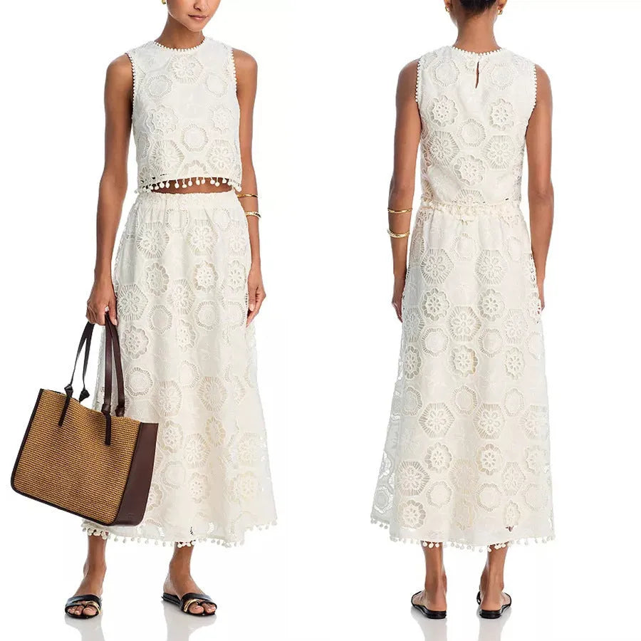 Women's white embroidered sleeveless suit with matching long skirt, retro two-piece set on a hanger