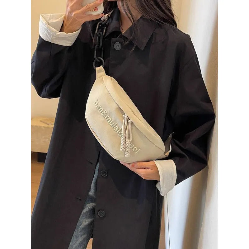 Women's nylon sports shoulder bag in beige with letter and embroidery details and chain accent