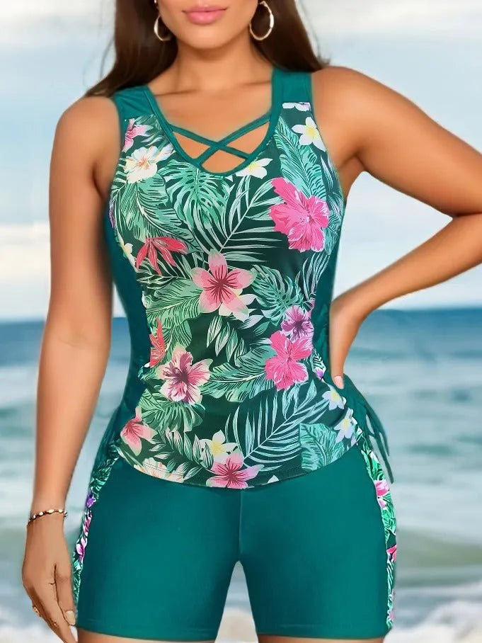 Plus size women's floral print swimsuit bikini with high waist briefs in navy blue.