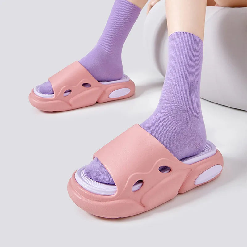 EVA slippers with leather lining in pink purple colour combination showing round toe shape