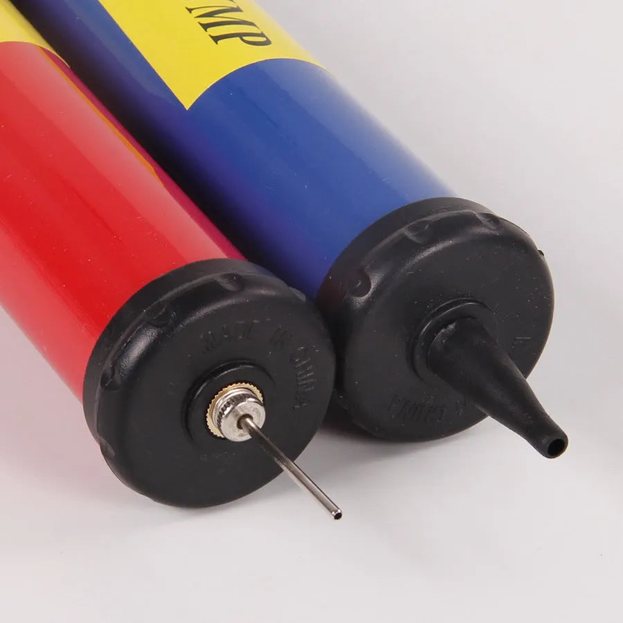 Mixed colour plastic manual hand pump for sports balls on a white background