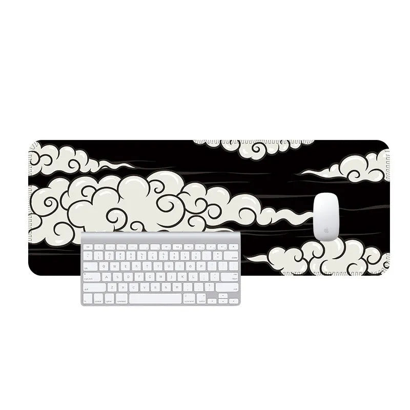 Large cloud pattern mouse pad desk mat with natural rubber non-slip base on wooden desk