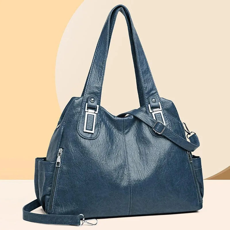 Soft square women's tote bag in various colours with a single shoulder strap and zip pocket inside.