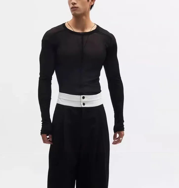 Black slim-fit women's pullover top with a mesh see-through texture and long sleeves.