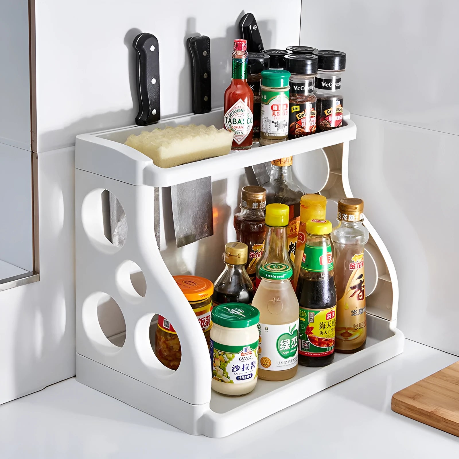 Foldable multi-layer kitchen storage rack in a choice of colours on a countertop.