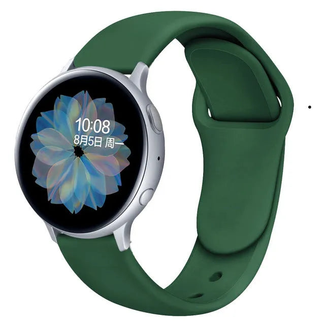 Samsung Galaxy Active 2 watch with a purple reverse buckle silicone strap on a wrist.