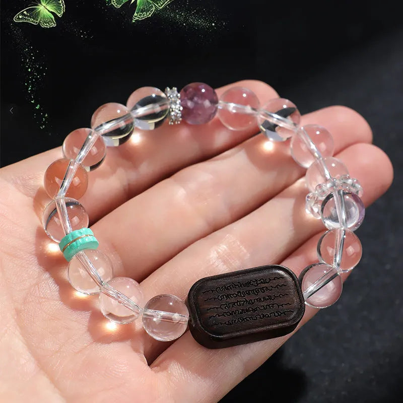 Natural white crystal ebony five warp bracelet showing handmade ethnic design with wood and crystal materials