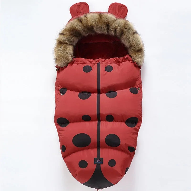 Baby warm cocoon style sleeping bag on a neutral background demonstrating solid colour design with zip closure