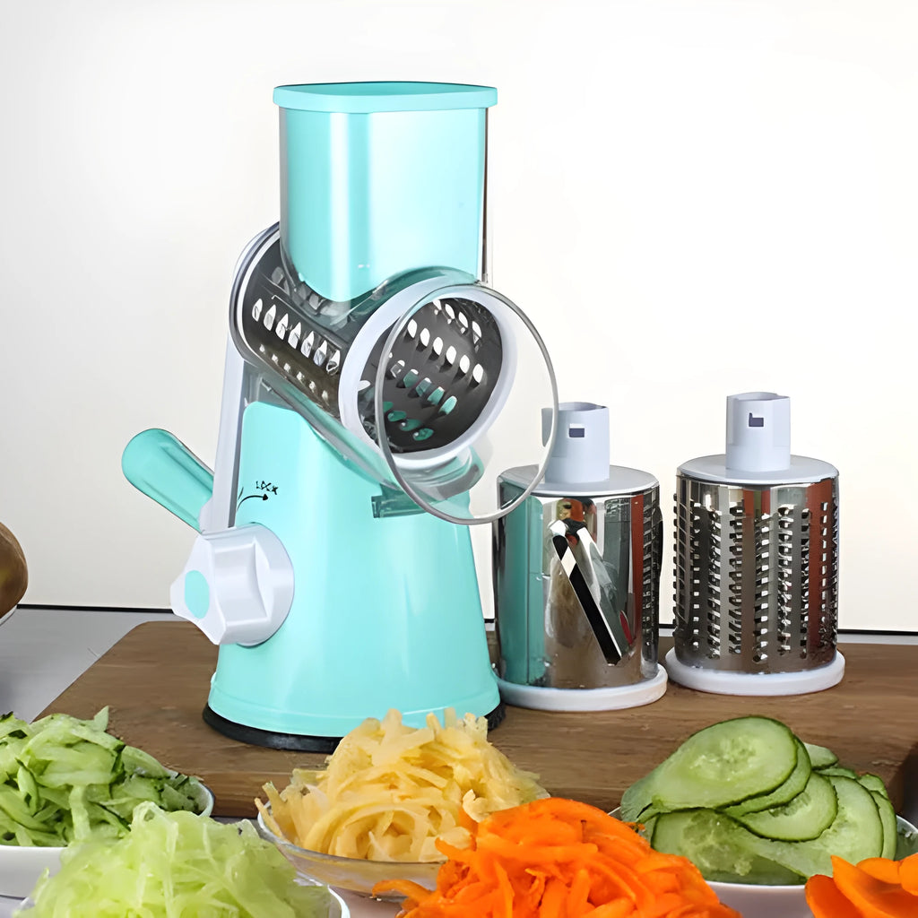 Blue round manual mandoline slicer with stainless steel blade for vegetables on a kitchen counter.