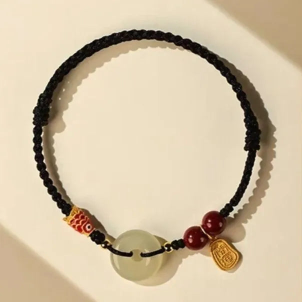 Hetian jade peace buckle bracelet with 10mm stone on a braided rope